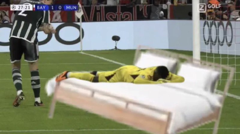 a soccer player is lying on the ground